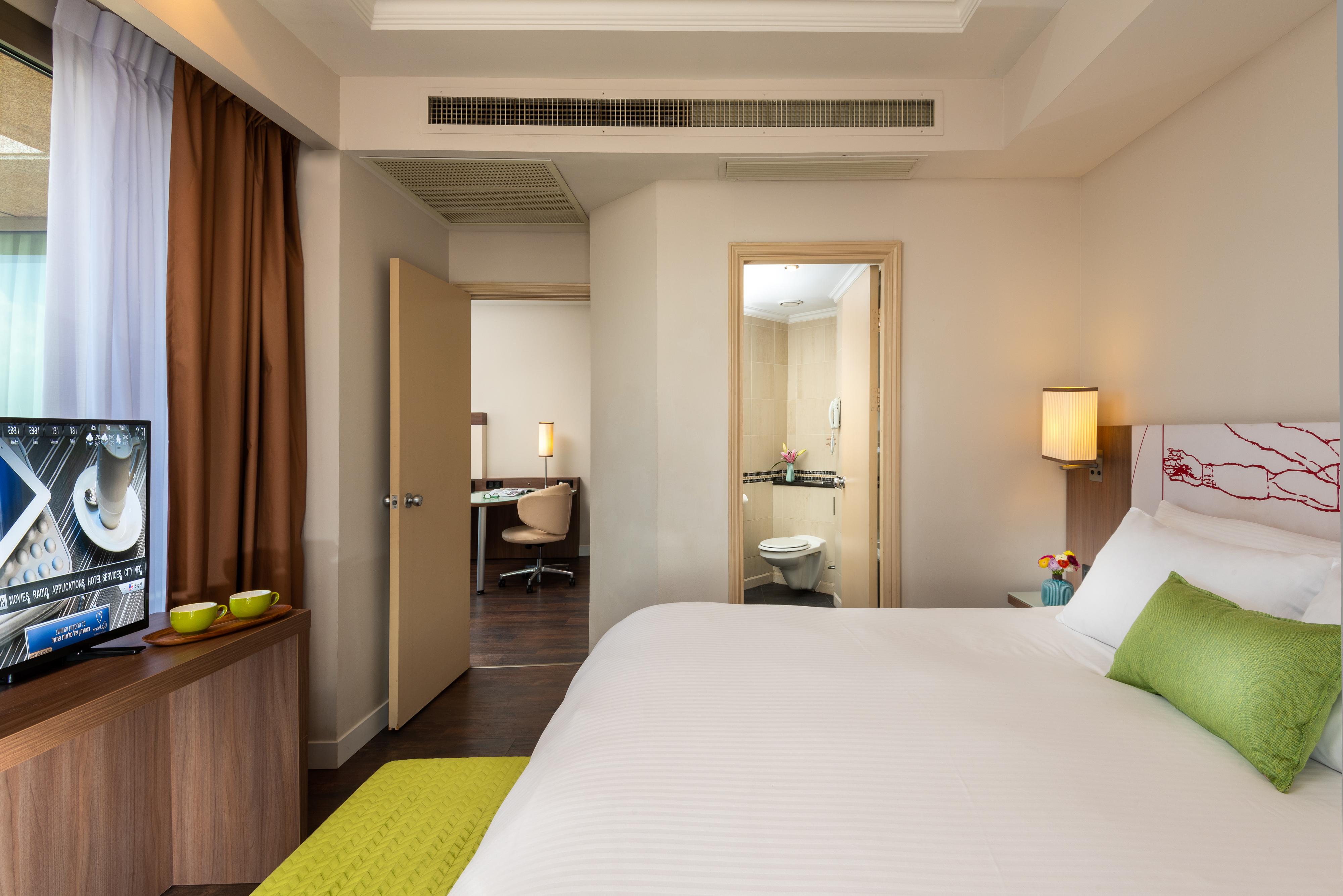 レオナルド シティ タワー ホテル テル アビブ Giv‘atayim エクステリア 写真 A bedroom at the hotel